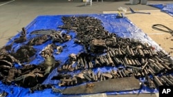 This undated photo, provided by the Las Vegas Police Department, shows items found inside a Tesla Cybertruck involved in an explosion outside the Trump Hotel in Las Vegas.