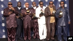 FILE - The Blind Boys Of Alabama hold Grammys for Best Traditional Soul Gospel Album at the 45th Annual Grammy Awards, Feb. 23, 2003, in New York. 