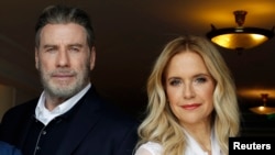 John Travolta and Kelly Preston promote the film "Gotti" at the 71st Cannes Film Festival in Cannes, France, May 14, 2018.