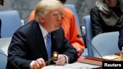 U.S. President Donald Trump, representing the United States as current President of the United Nations Security Council, bangs the gavel to open the U.N. Security Council meeting at the 73rd session of the United Nations General Assembly at U.N. headquarters in New York, Sept. 26, 2018.