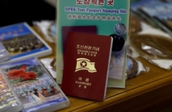 FILE - A North Korean tour passport is seen at a souvenir shop at Juche Tower in Pyongyang, North Korea, Sept. 11, 2018.