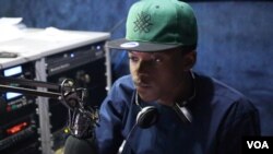 Kaduna-native Jakes Tudu hosts a weekly radio show to promote local rappers. (C. Oduah/VOA)