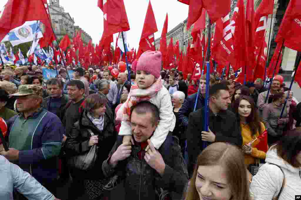 Supporters of the Social Democratic Party and their supporters celebrate May Day in downtown Kiev, Ukraine, May 1, 2017. 