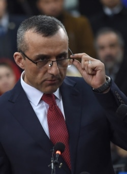 FILE - Then-first vice-presidential candidate Amrullah Saleh looks on as he speaks to the media after arriving at the Independent Electoral Commission office in Kabul on Jan. 20, 2019.