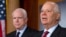 FILE - Sen. Ben Cardin, right, holds a news conference with Sen. John McCain during a media availability on Capitol Hill in Washington, Dec. 6, 2012. 