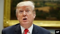 President Donald Trump speaks before hosting a lunch with Senate Republicans in the Roosevelt Room of the White House, Dec. 5, 2017, in Washington.