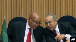 S. African President and Chairperson of the AU Committee on Libya, Jacob Zuma, left, talks with Ramtane Lamamra, African Union Commissioner for Peace and Security (File)
