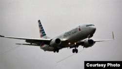 FILE - An American Airlines aircraft is preparing to land at Reagan National airport near Washington, DC. (Photo: Diaa Bekheet)