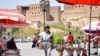Small stores, street vendors and teahouses dot the outskirts of Irbil, Iraq.