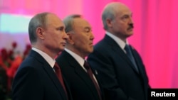 From left: Russian President Vladimir Putin, Kazakh President Nursultan Nazarbayev, and Belarus President Alexander Lukashenko before meeting of Eurasian Economic Union, Astana, Kazakhstan, May 29, 2014.