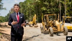 Stephen Bell, president and CEO of the Arkadelphia Area Chamber of Commerce, talks about a new railroad spur that is being built to support the needs of what he hopes will be a new paper mill, one of several Chinese-backed deals Arkansas has landed in recent years, in Arkadelphia, Ark., July 25, 2018. State and local officials in Arkansas are scrambling to preserve development deals with Chinese companies amid President Donald Trump's escalating tariff battle. "It's like a dark cloud hanging over the future of the project," Bell said. "Right now, the clouds are off on the horizon. But I think no one knows where the trade situation is going right now."