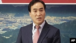 In this Jan. 23, 2018, photo, Kim Jong Yang, the senior vice president of Interpol executive committee, speaks during a press conference in Changwon, South Korea. Kim, the acting president of Interpol.