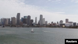FILE - A portion of the City of Miami's skyline, is seen near the Port of Miami in Miami, Florida. Miami is among numerous cities around the world predicted to face massive flooding as a result of climate change. 