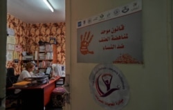 Heba Adel, a lawyer and activist from the Egyptian Female Lawyers Initiative, works in her office in downtown Cairo, July 9, 2020. (Hamada Elrasam/VOA)