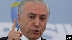 Brazil's President Michel Temer speaks at the Planalto Presidential Palace, in Brasilia, Brazil, April 27, 2018.