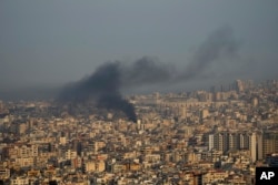 Smoke rises from Israeli airstrikes on Dahiyeh in Beirut's southern suburbs on Oct. 16, 2024.