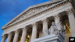 FILE - The Supreme Court building is seen at seen sunset in Washington, Feb. 13, 2016.