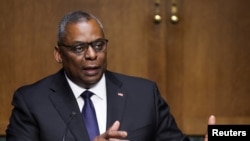 FILE - U.S. Defense Secretary Lloyd Austin testifies on the Pentagon budget request during a Senate Appropriations Committee hearing on Capitol Hill in Washington, June 17, 2021. 