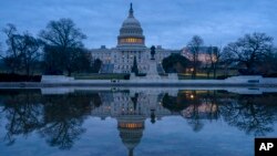 The Capitol is seen under early morning skies in Washington, Dec. 20, 2018. 