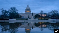 The Capitol is seen under early morning skies in Washington, Dec. 20, 2018. 