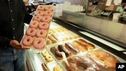 FILE - In this April 26, 2011 file photo, doughnuts are displayed in Chicago.