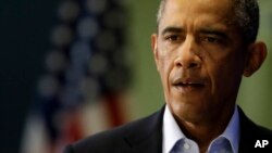 President Barack Obama arrives to speak in Edgartown, Mass., Aug. 20, 2014, about the killing of American journalist James Foley by militants with the Islamic State extremist group. 