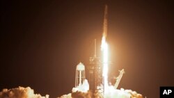 A SpaceX Falcon 9 rocket and Dragon capsule with a crew of four on a mission to the International Space Station lifts off from pad 39A at the Kennedy Space Center in Cape Canaveral, Fla., March 3, 2024. 