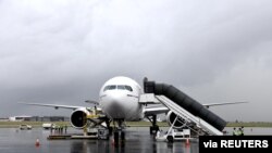 An aircraft carrying South Africa's first COVID-19 vaccine doses arrives at OR Tambo airport in Johannesburg, South Africa, Feb. 1, 2021. (Elmond Jiyane for GCIS/Handout via Reuters) 
