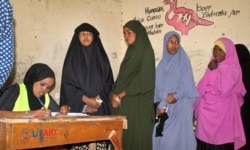Women wait to cast their votes in the presidential election in Hargeisa, in the semi-autonomous region of Somaliland, in Somalia, Nov. 13, 2017.