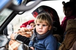 Syrian civilians flee from Idlib as Syrian troops wage an offensive in the last rebel stronghold according to news reports, Feb. 13, 2020.