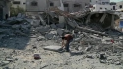 Palestinians Turn to Rebuilding Gaza