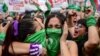 Argentina's Abortion Law Enters Force Under Watchful Eyes 