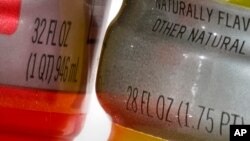 Bottles of Gatorade are pictured, left, a 32 fluid ounce and 28 fluid ounce, in Glenside, Pa., Monday, June 6, 2022. (AP Photo/Matt Rourke)