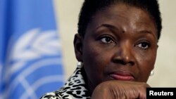 Humanitarian Affairs (OCHA), pauses during a news conference after the seventh Syrian Humanitarian Forum at the United Nations European headquarters in Geneva, Feb. 19, 2013.