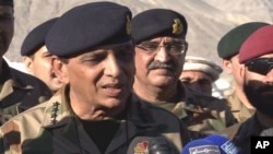 Pakistan's army chief Gen. Ashfaq Parvez Kayani talks with reporters after visiting the Siachen Glacier, where a huge avalanche buried some 140 people, April 18, 2012.