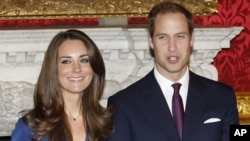 Britain's Prince William and his fiancee Kate Middleton pose for a photograph in St. James's Palace in central London, November 17, 2010