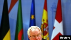 FILE - Christopher Patten, then-European Commissioner for External Relations, speaks at the 5th Euro-Mediterranean Conference in Valencia, Spain, April 22, 2002.
