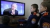 Putin Backs Proposed Ban on US Adoptions
