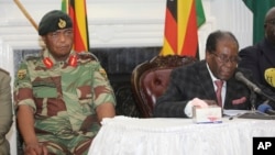 Zimbabwean President Robert Mugabe delivers his speech during a live broadcast at State House in Harare, Nov, 19, 2017. 