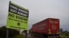 FILE - A sign for "No border" is seen on the border between Northern Ireland and Ireland in Jonesborough, Northern Ireland, Dec. 10, 2018.