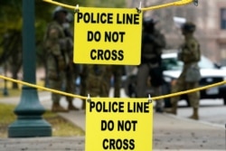The grounds of the Texas State Capitol remain closed and protected by the National Guard, in Austin, Texas, Jan. 20, 2021.
