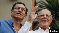 FILE - Peru's Vice President Martin Vizcarra, left, and President Pedro Pablo Kuczynski greet the media in Lima, Peru, March 16, 2016.