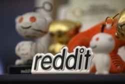 FILE - Reddit mascots are displayed at the company's headquarters in San Francisco.