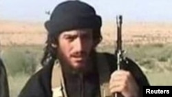 FILE - Islamic State spokesman Abu Muhammad al-Adnani is pictured in this undated handout photo, courtesy the U.S. Department of State.