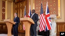 U.S. Secretary of State Antony Blinken, left, speaks during a joint press conference with Britain's Foreign Secretary David Lammy in the Locarno room at the Foreign, Commonwealth and Development Office in London, Sept. 10, 2024.