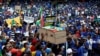Protesters carry a mock coffin at the Freedom Day rally organized by the newly-formed Freedom Movement in Pretoria, South Africa, April 27, 2017. 