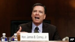 FILE - FBI Director James Comey testifies on Capitol Hill in Washington, May 3, 2017, before the Senate Judiciary Committee hearing: "Oversight of the Federal Bureau of Investigation." 