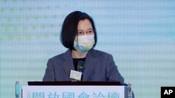 FILE - Taiwan's President Tsai Ing-wen delivers a speech during the opening of the 2021 Open Parliament Forum in Taipei, Taiwan, Dec. 2, 2021. Taiwan will be among the participants of a Summit for Democracy hosted by U.S. President Joe Biden. 