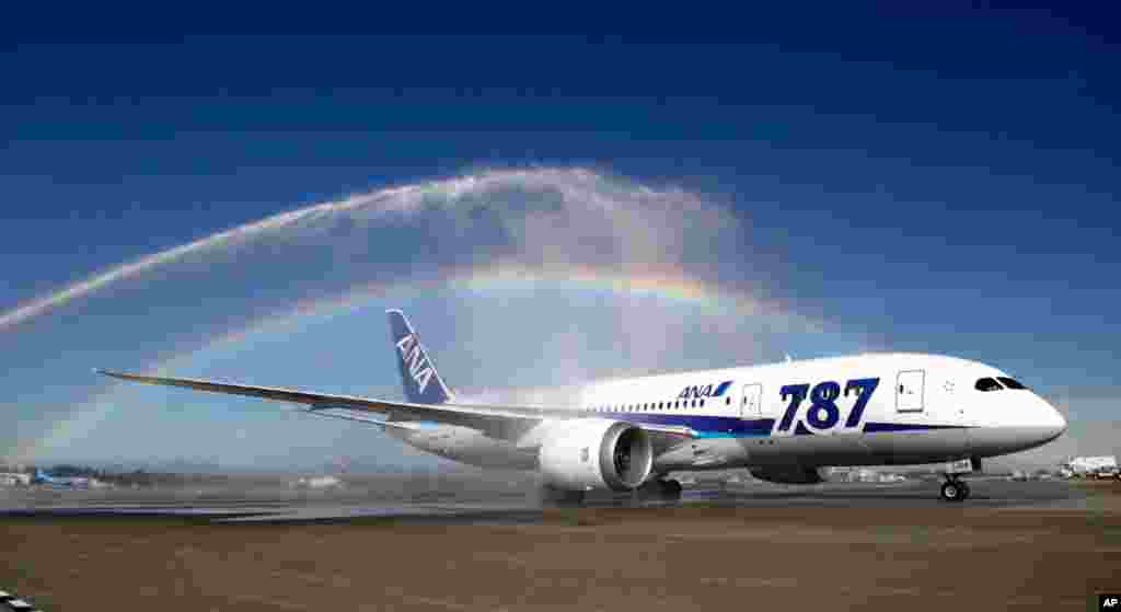  A Boeing 787 at Seattle-Tacoma International Airport, October 1, 2012, during an official welcome ceremony after it landed on the first day of service for the aircraft on ANA's Seattle-Tokyo route.