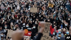 Protesters gather in Sydney, June 6, 2020, to support the cause of U.S. protests over the death of George Floyd. 